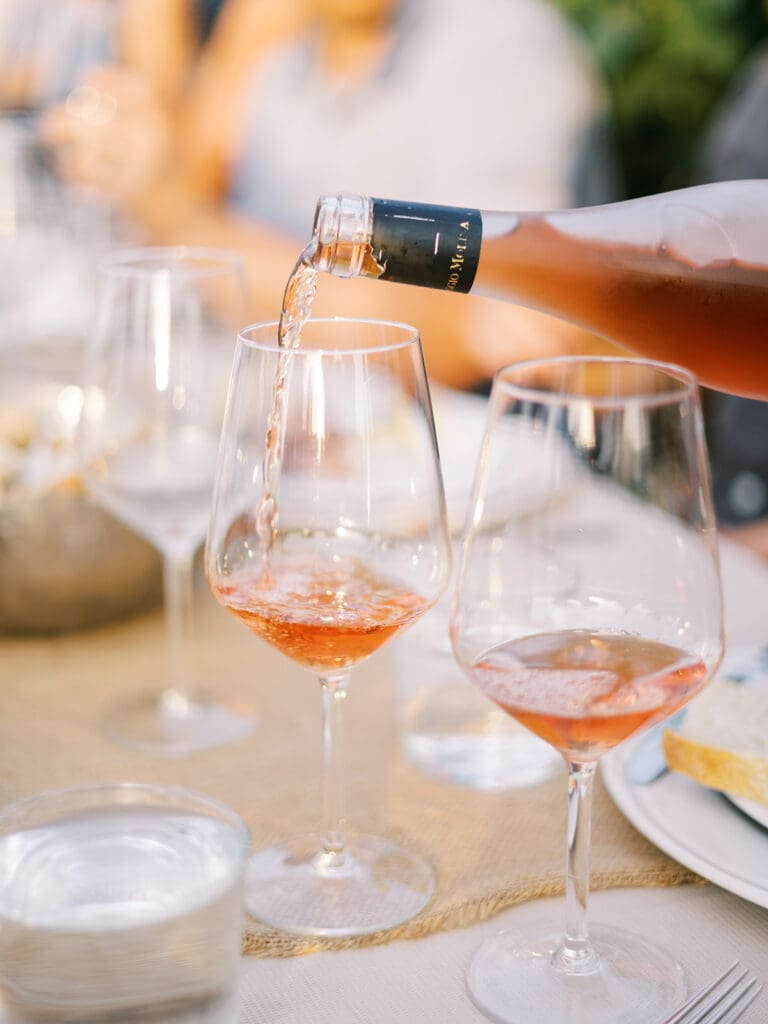 Wine being poured into glasses