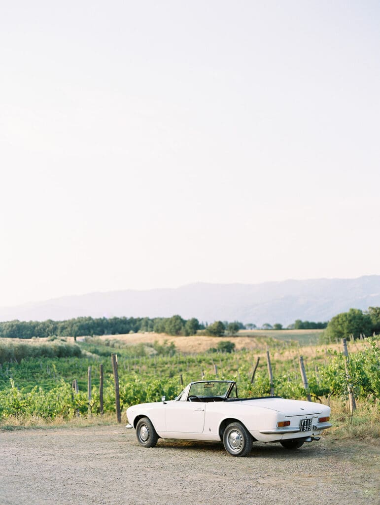 Classic white convertible car in Italy