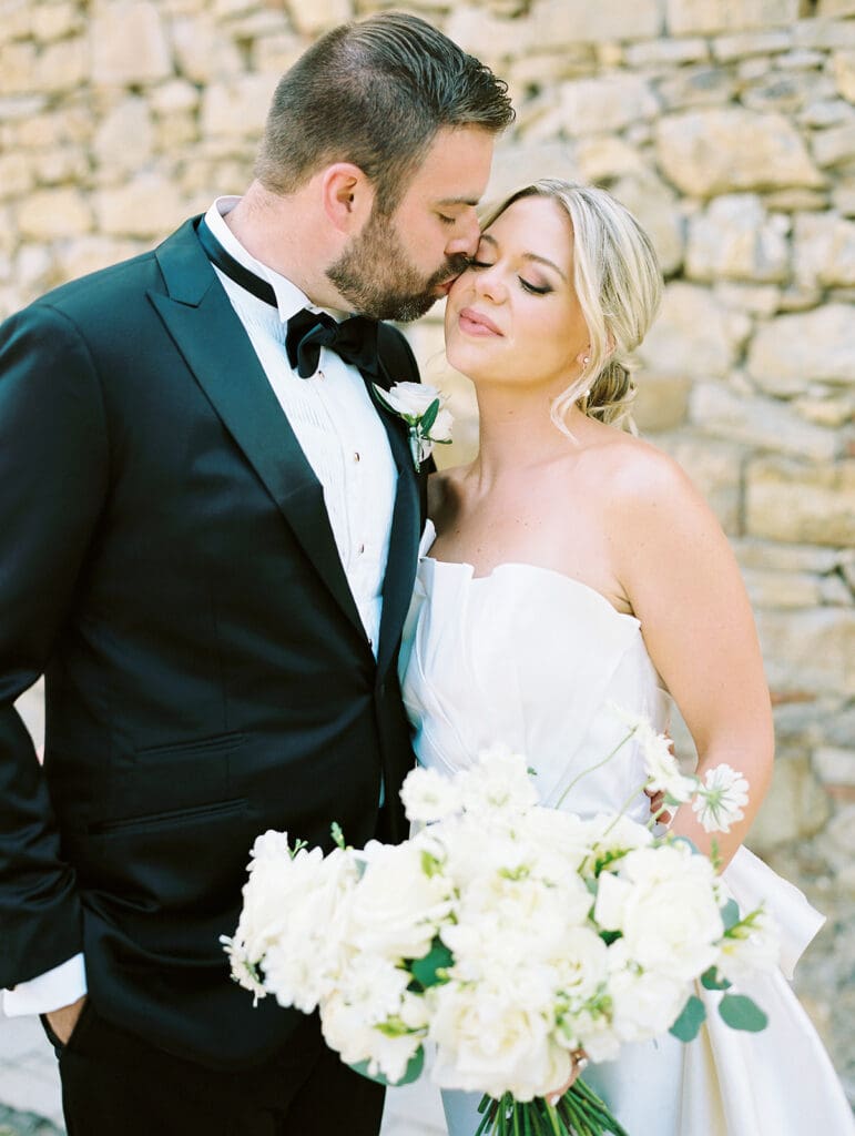 Bride and grooms portraits from their summer wedding in Tuscany, Italy at Villa Petrea