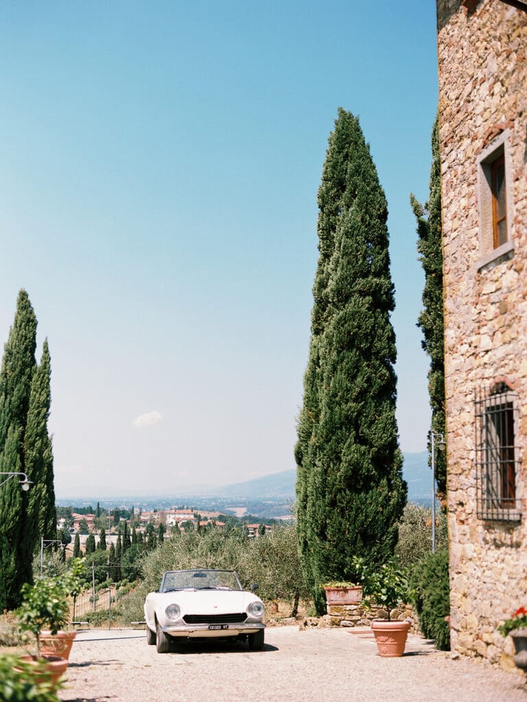 Classic white car at Villa Petra in Tuscany, Italy