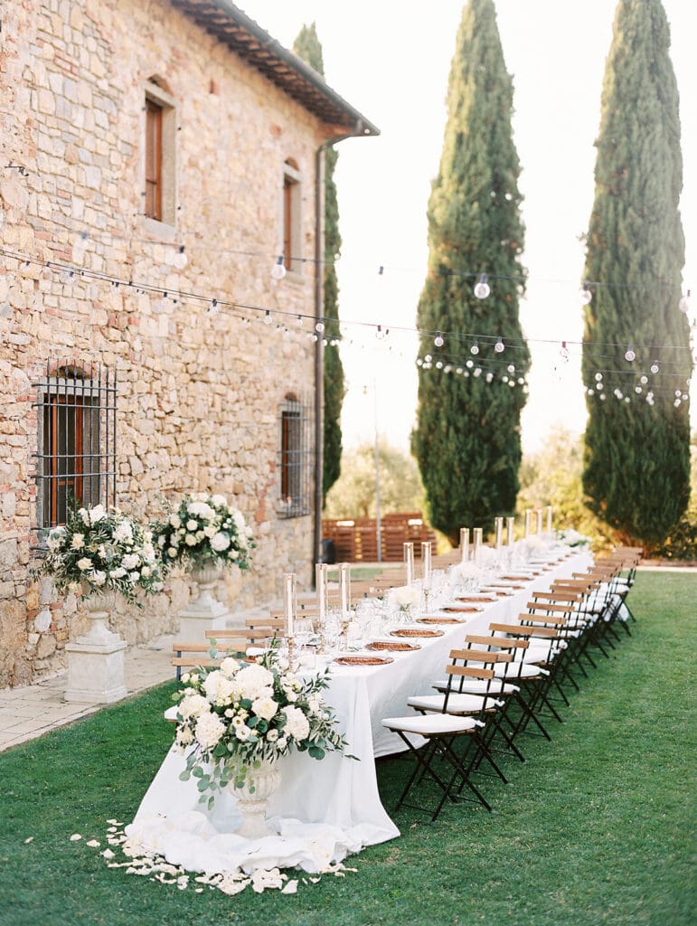 Outdoor summer wedding reception in Tuscany, Italy at Villa Petrea