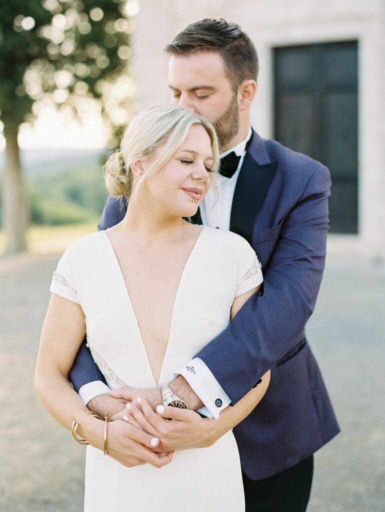 Sunrise bride and groom portraits at Chapel Vitalenta in Sienna, Italy