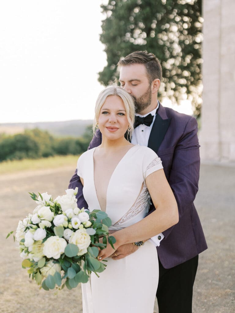 Sunrise bride and groom portraits at Chapel Vitalenta in Sienna, Italy