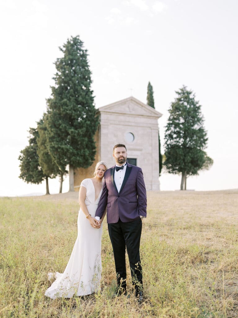 Sunrise bride and groom portraits at Chapel Vitalenta in Sienna, Italy