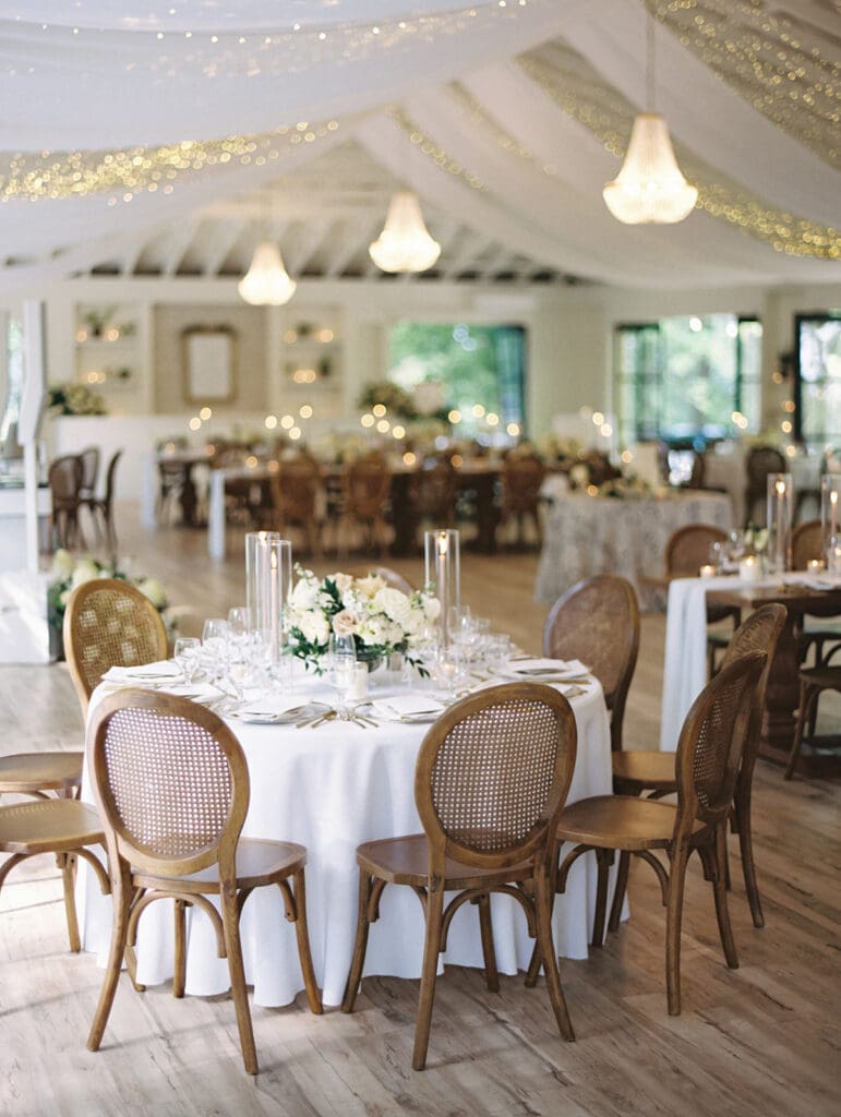 A classic and elegant indoor Michigan wedding reception at Greencrest Manor wedding venue in Battlecreek captured on film. 