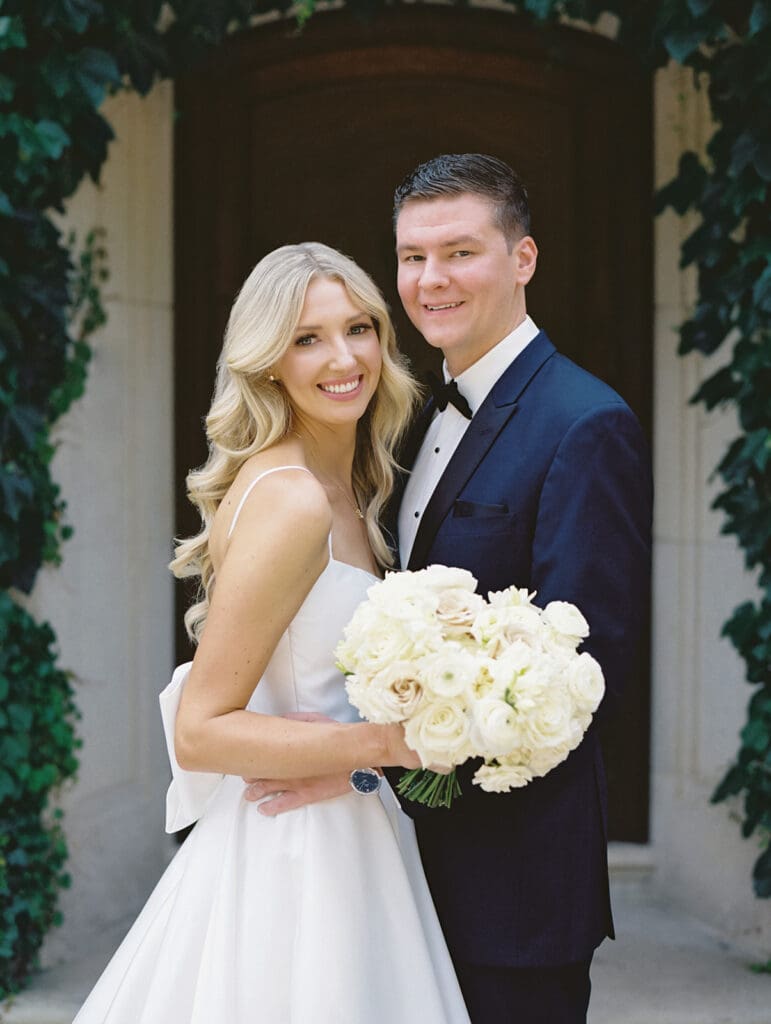Bride and grooms portraits outside of Greencrest Manor wedding venue in Battle Creek, Michigan