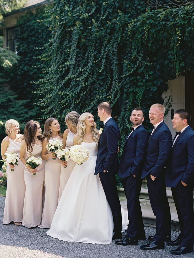 Wedding party photos outside of Greencrest Manor wedding venue in Battle Creek, Michigan