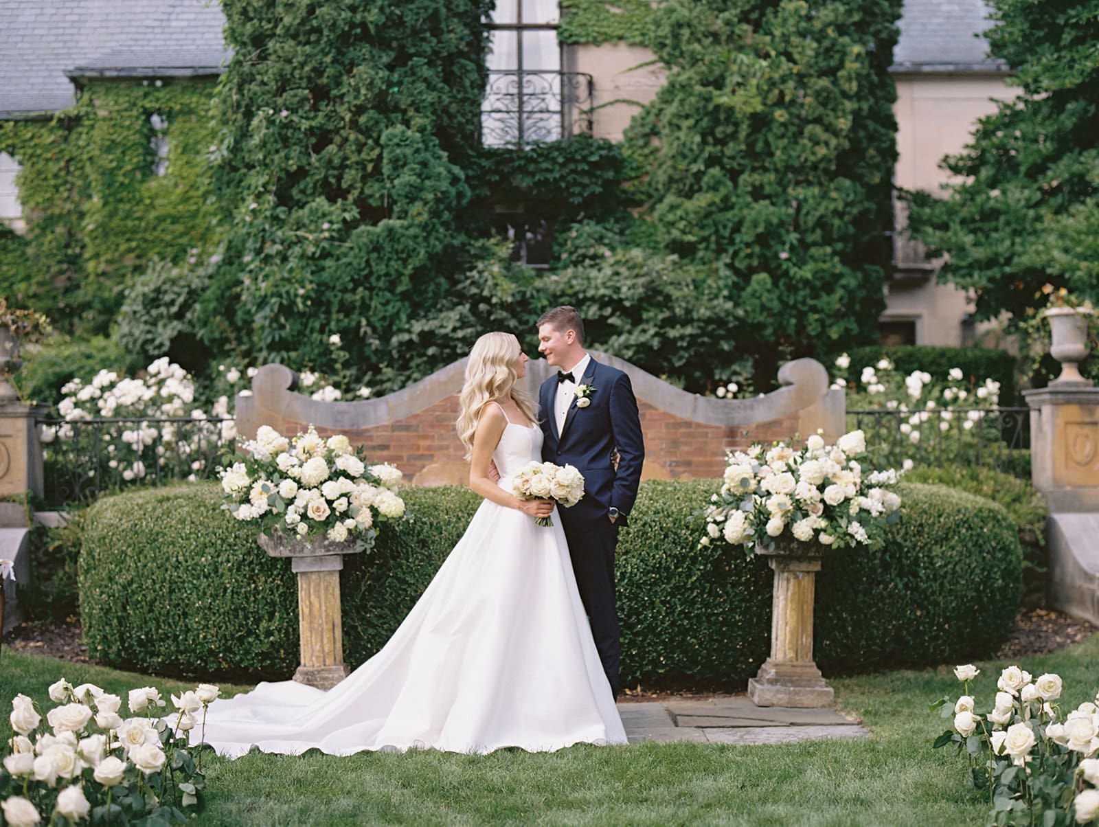 Bride and grooms outdoor portraits at Greencrest Manor wedding venue in Battle Creek, Michigan