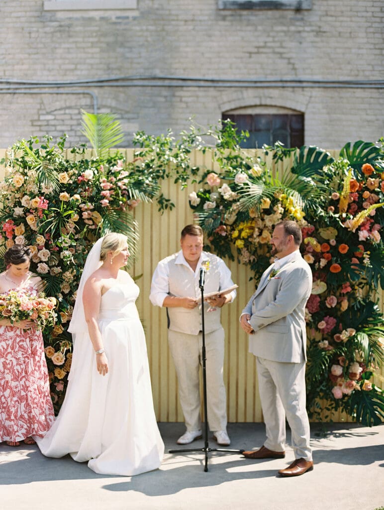 Bride and groom during their outdoor Journeyman Distillery wedding ceremony in Three Oaks, Michigan