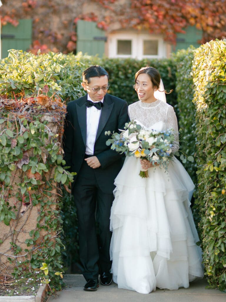 Bride walking down the aisle with her father