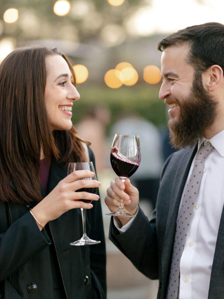Man and woman drinking wine during a cocktail hour at Viansa Winery