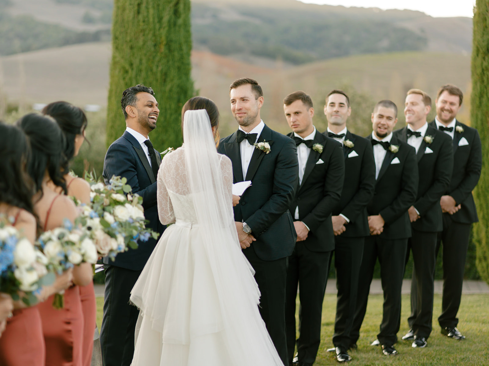Bride reading her vows during their Viansa Winery wedding ceremony in Sonoma, California