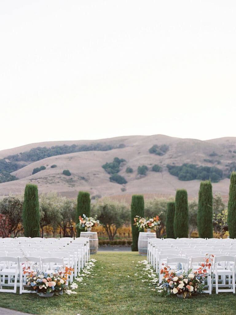 An outdoor fall Viansa Winery wedding ceremony in Sonoma, California