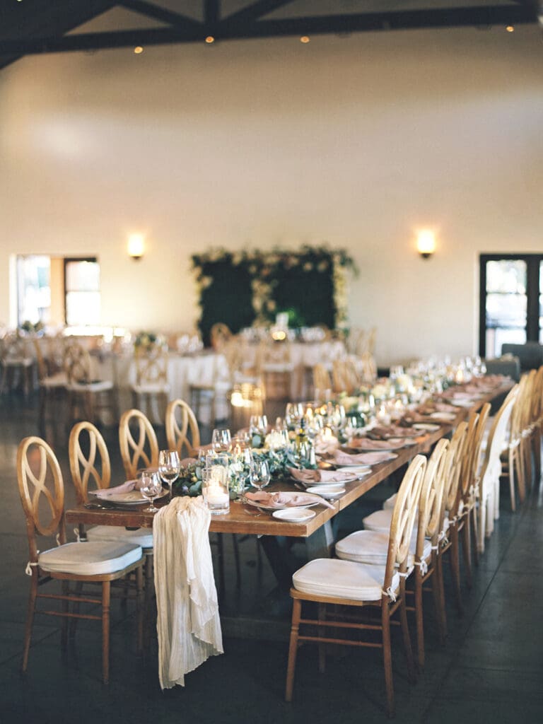Elegant indoor Viansa Winery wedding reception decor in Sonoma, California on film
