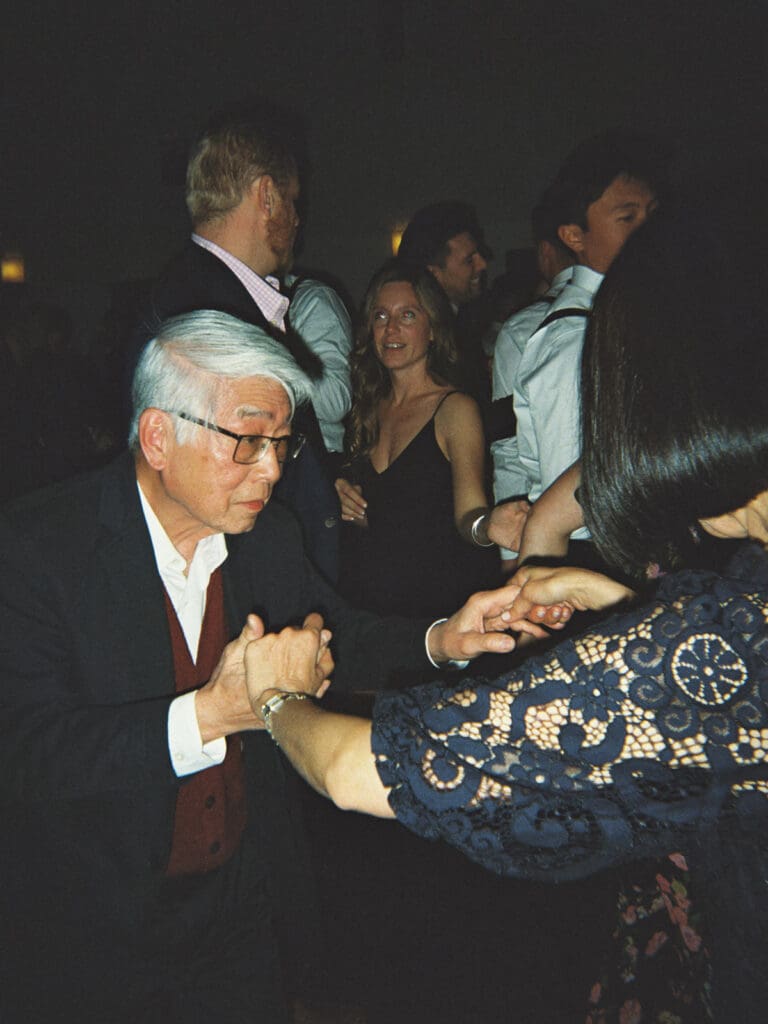 Wedding guests dancing during the reception captured on film