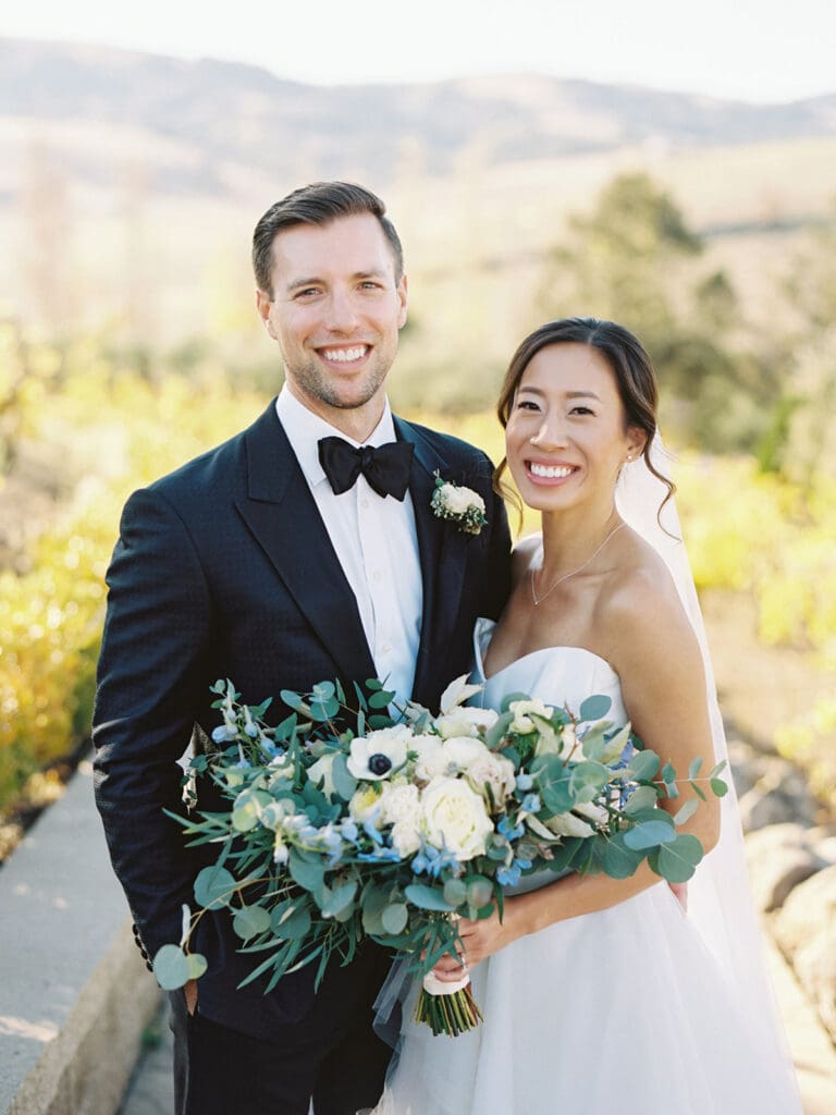 Bride and grooms outdoor fall wedding portraits at Viansa Winery wedding venue in Sonoma, California