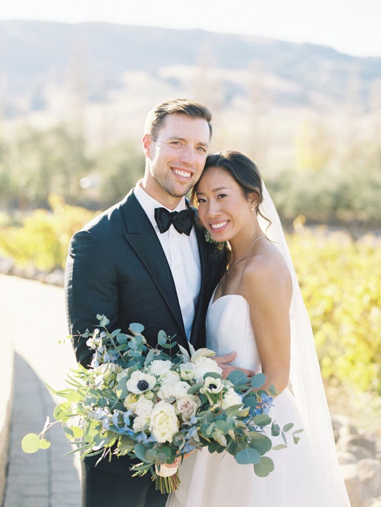 Bride and grooms outdoor fall wedding portraits at Viansa Winery wedding venue in Sonoma, California