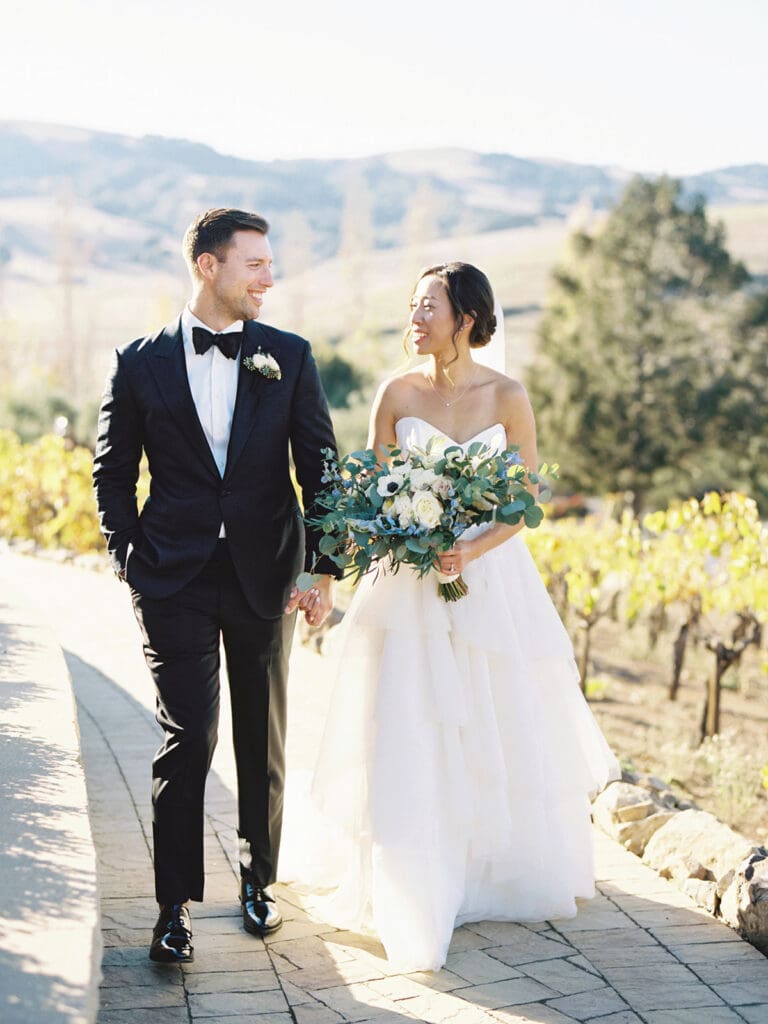 Bride and grooms outdoor fall wedding portraits at Viansa Winery wedding venue in Sonoma, California