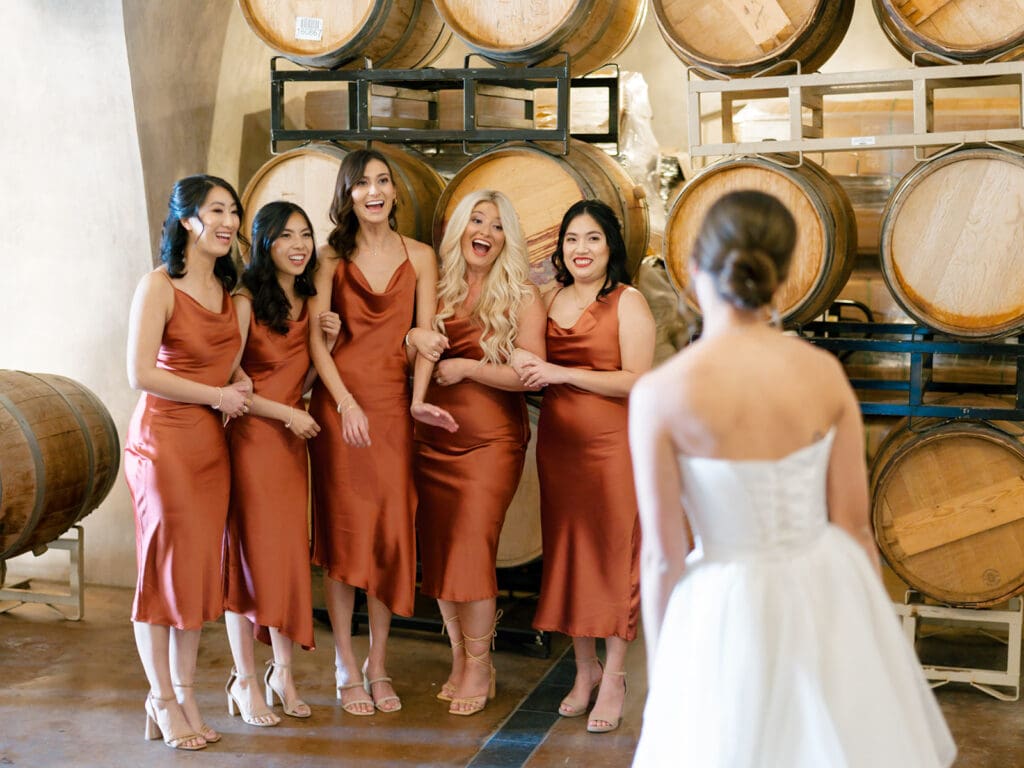 Bride sharing a first look with her bridesmaids