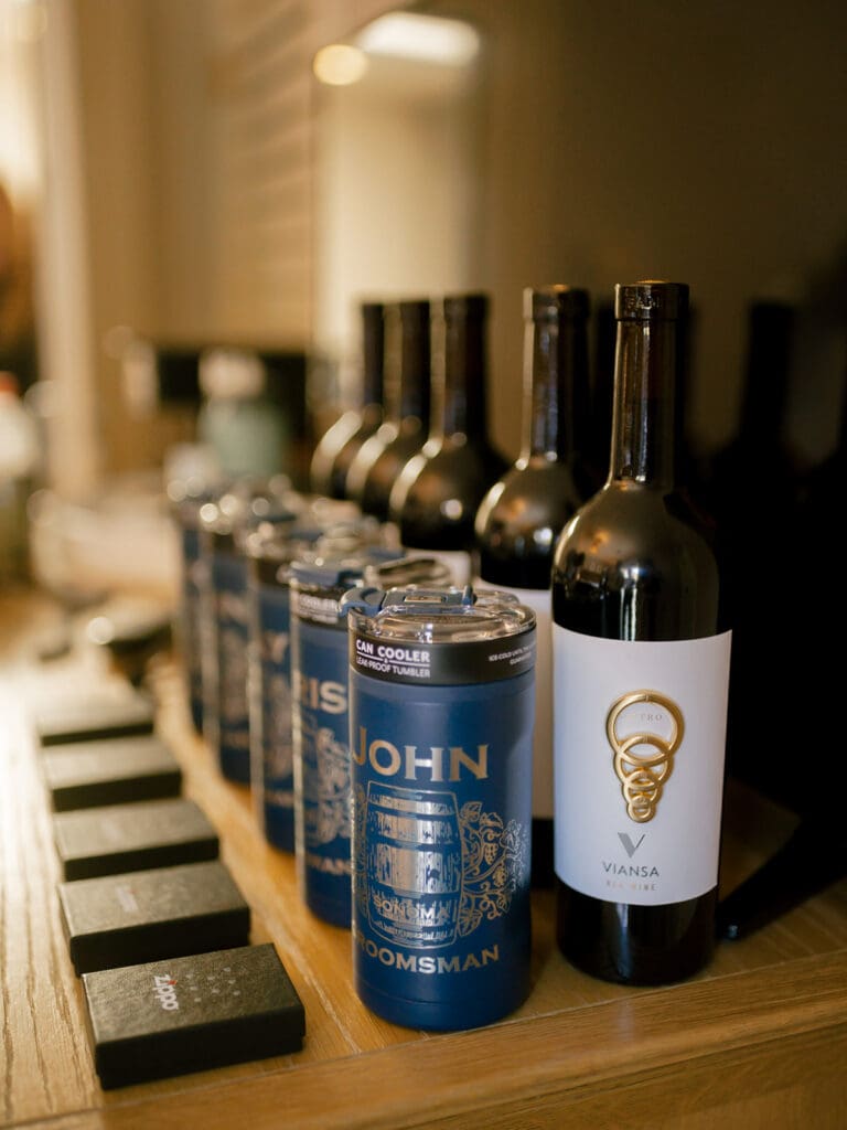 Custom groomsmen cups and Viansa Winery bottles of wine