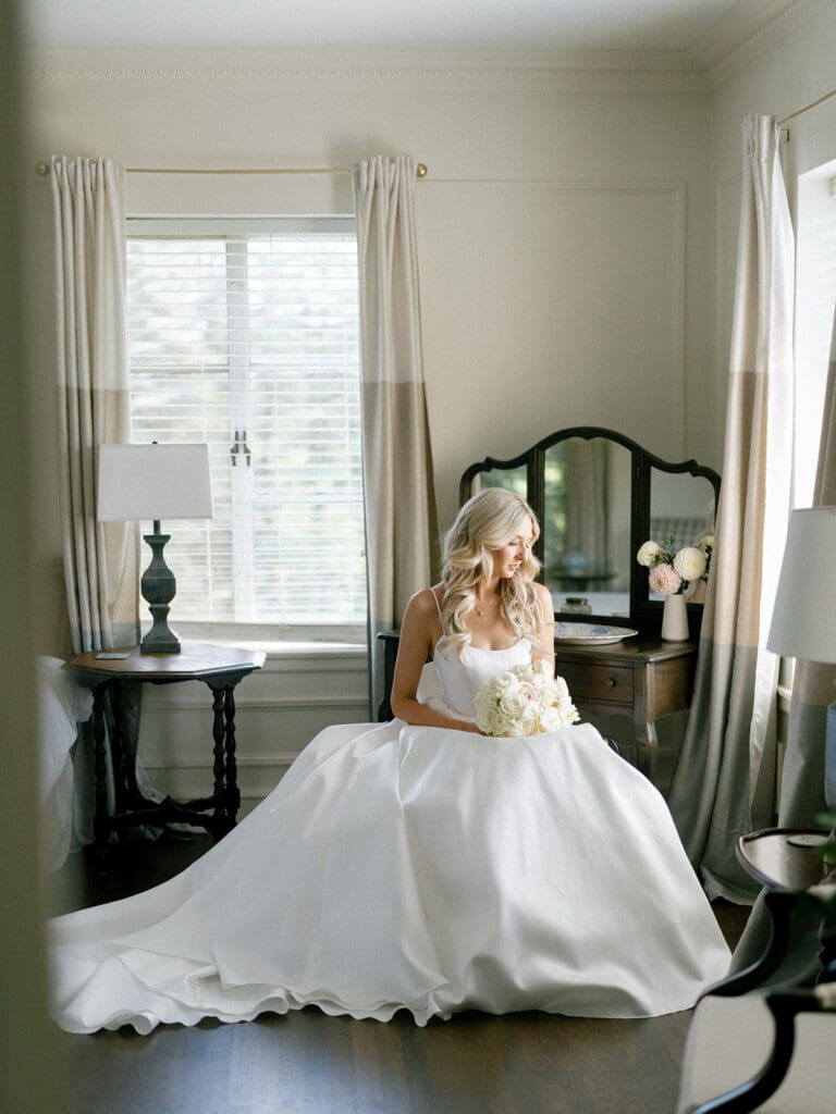 Indoor bridal portraits in one of the master suites at Greencrest Manor wedding venue