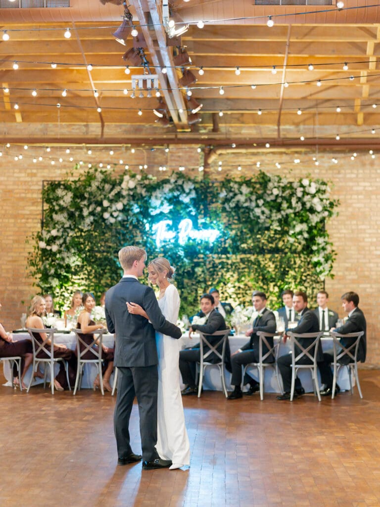 Bride and grooms first dance during their Rockwell on The River wedding reception in downtown Chicago