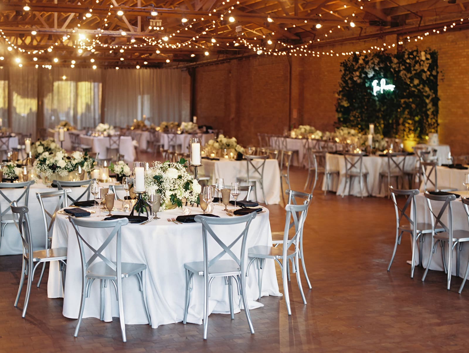 An indoor fall wedding reception at Rockwell on The River in downtown Chicago, Illinois