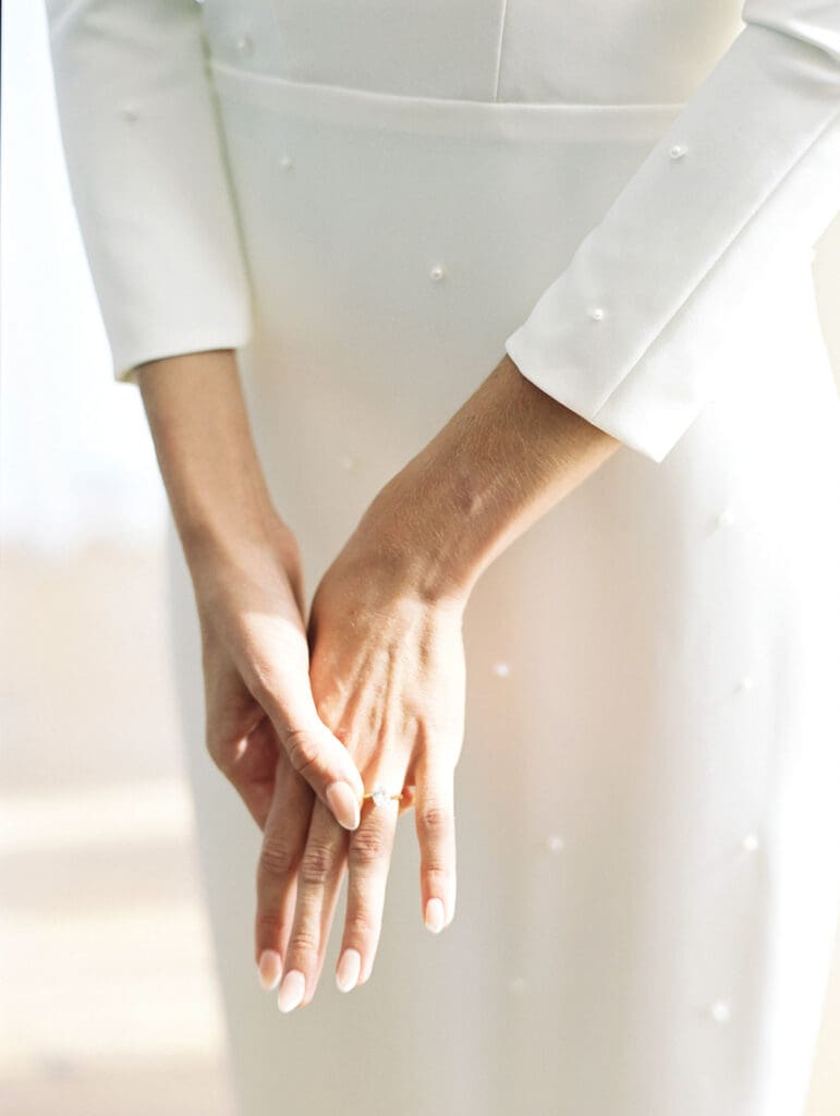 Close up shot of a bride wearing her ring