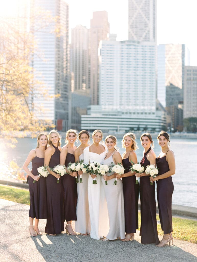 Bride and bridesmaids fall downtown wedding portraits
