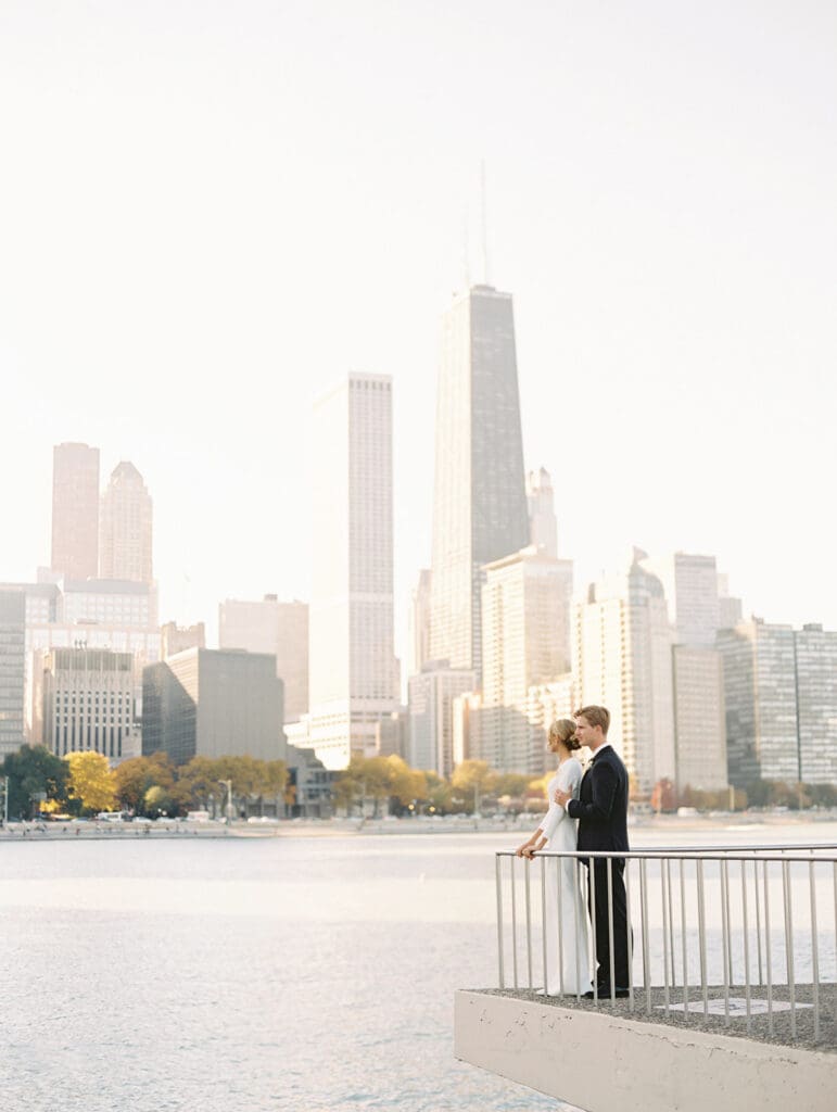 Bride and groom posing for their downtown Chicago wedding portraits