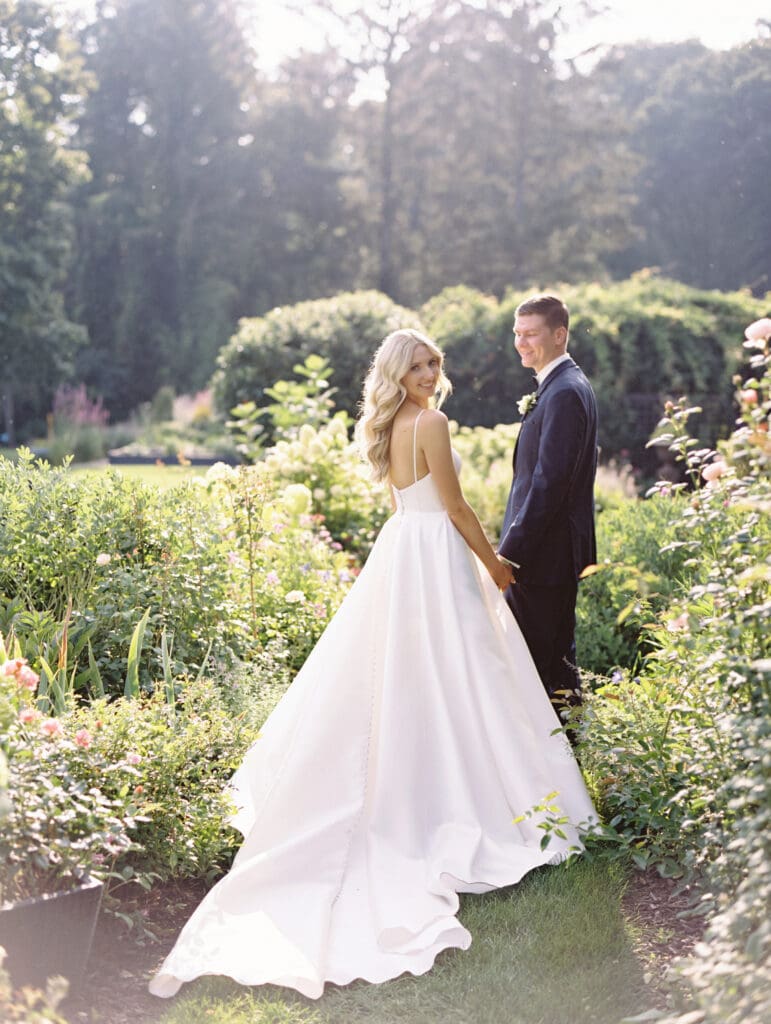 Bride and grooms portraits in the Gardens at Greencrest Manor - Estate wedding venue in Michigan