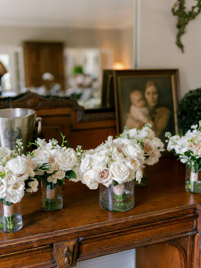 Bride and bridesmaids florals in a vase of water