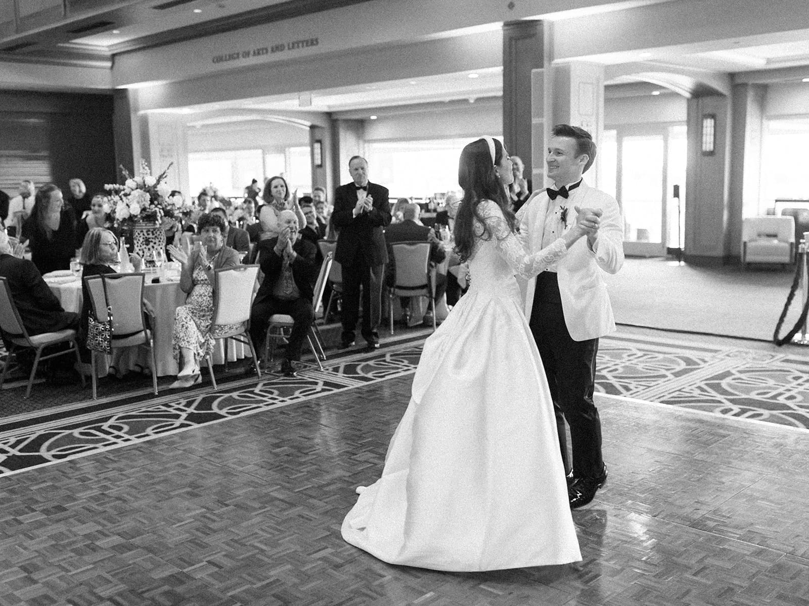 Black and white photo of a bride and grooms first dance in Downes Ballroom for their Notre Dame wedding