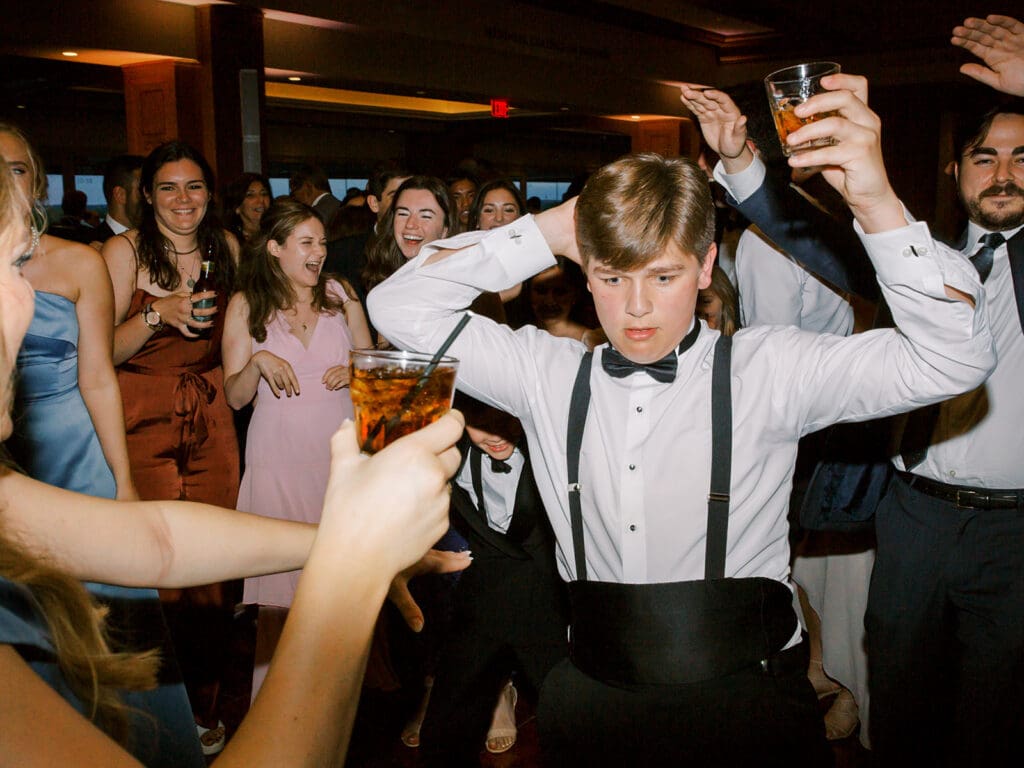 Little boy dancing during an Indiana wedding reception