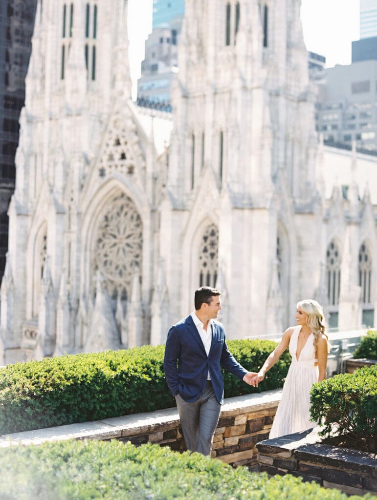 Couple walking through 620 Loft and Garden for their New York engagement photos on film