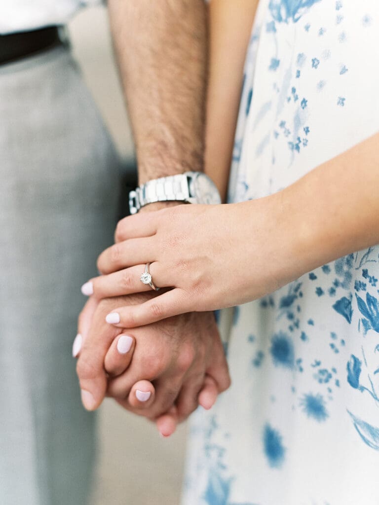 Couple holding hands