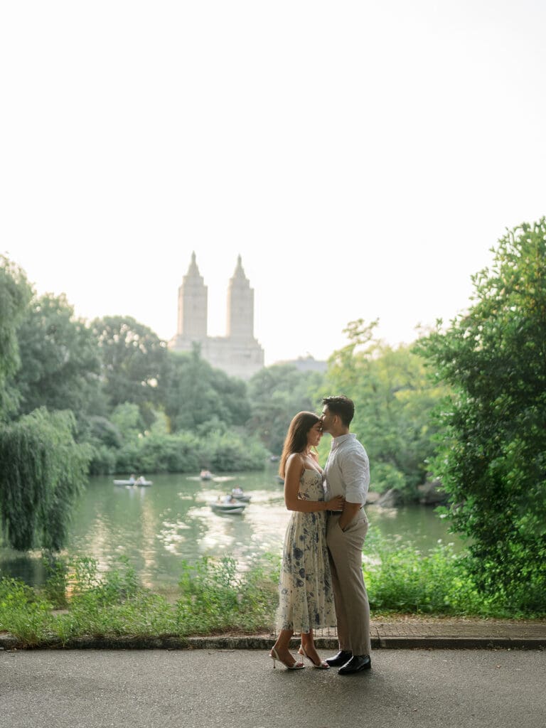 Couple posing for their Central Park engagement photos in New York City