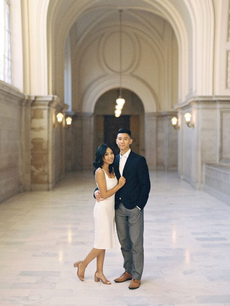 Couple posing for their San Francisco engagement photos