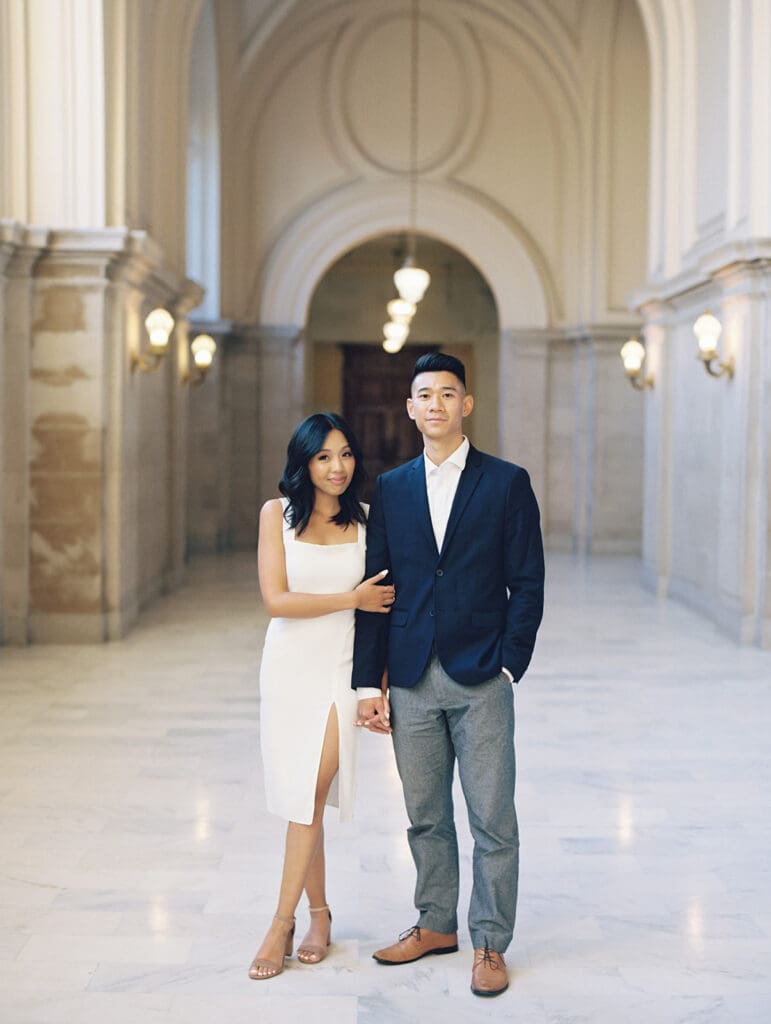 Couple posing for their engagement session