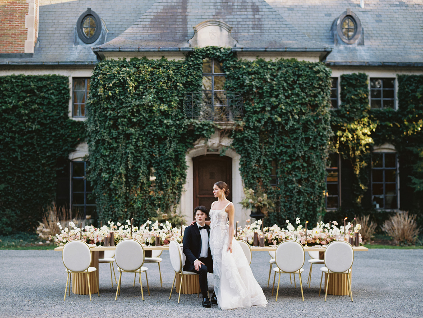 Bride and groom portraits in front of Greencrest Manor - Estate wedding venue located in Battle Creek, Michigan