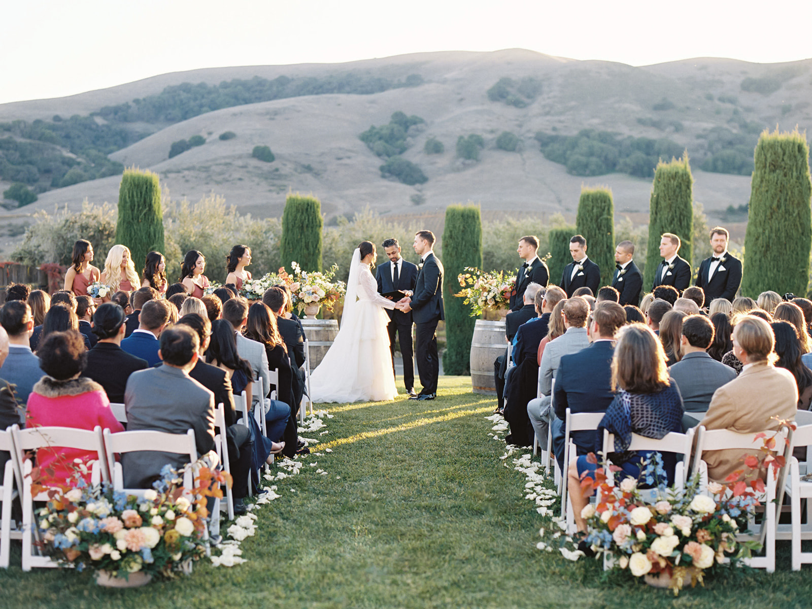 An outdoor fall Viansa Winery wedding ceremony in Sonoma, California